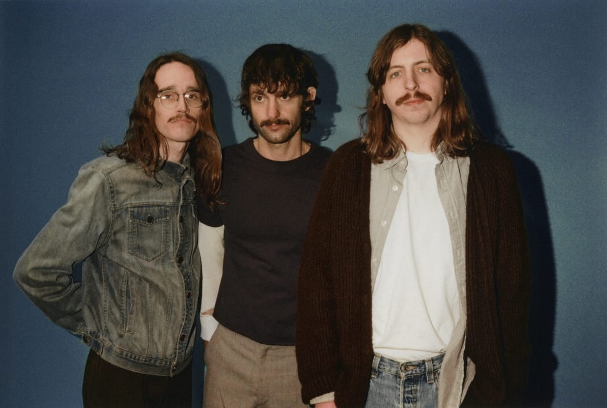 Triathalon reflects on the past on their fuzzy new single "DOWN"