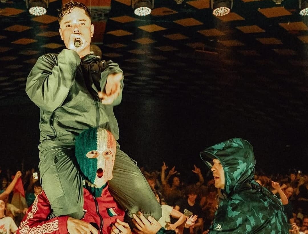 Members of UK government push music festivals to drop Kneecap from lineups; counter-terrorism police now involved