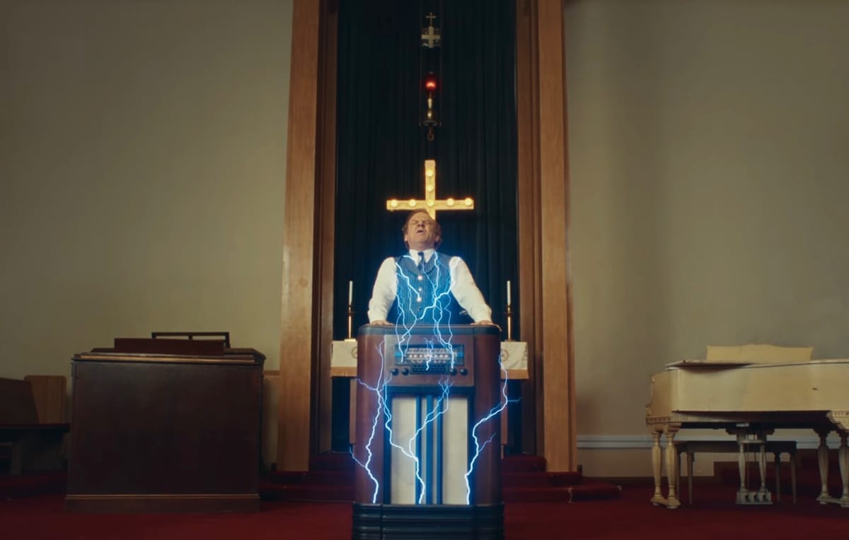 John C. Reilly stars in new music video for Jack White's "Archbishop Harold Holmes"