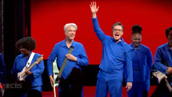 Stephen Colbert joins David Byrne onstage on his show
